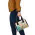 Butterflies daisies and peacock feathers shoulder handbag