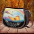 Butterflies fly to the sounds of violin and musical notes Saddle Bag