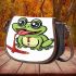 Cartoon cute frog spitting out red liquid saddle bag