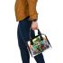 Cartoon tree frog sitting on top of an irish mushroom shoulder handbag