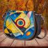 Circles and triangles in a blue sky saddle bag