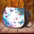 Colorful butterflies with pink and blue wings saddle bag