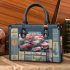 Colorful butterfly perched blooming roses small handbag
