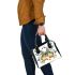 Colorful butterfly with floral elements shoulder handbag