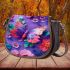 Colorful butterfly with flowers and leaves on purple saddle bag