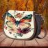 Colorful butterfly with flowers on its wings saddle bag