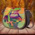 Colorful cartoon red eyed tree frog on the edge saddle bag