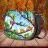 Colorful frogs hanging from tree branches in the jungle saddle bag