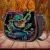 Colorful green frog playing banjo under mushroom saddle bag