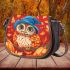 Colorful illustration of an owl wearing blue hat sitting saddle bag