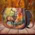 Create an illustration of the majestic deer saddle bag