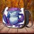 Crown on top of purple and blue tree frog cartoon caricature saddle bag