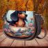 Curious canine in a floral oasis saddle bag