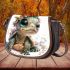 Cute baby turtle with big eyes wearing a floral crown saddle bag