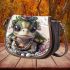 Cute baby turtle with big eyes wearing a floral crown saddle bag