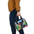 Cute black and tan dachshund in the garden with colorful tulips shoulder handbag