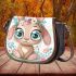 Cute cartoon bunny with big eyes sitting on the flowers saddle bag