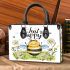 Cute cartoon drawing of a smiling bee doing small handbag