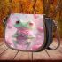 Cute cartoon frog holding a pink heart saddle bag