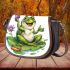 Cute cartoon frog sitting on a lily pad saddle bag