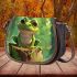Cute cartoon frog sitting on a tree stump saddle bag