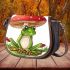 Cute cartoon frog sitting under an amanita muscaria mushroom saddle bag