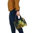 Cute cartoon green frog sitting on top of a bowl shoulder handbag