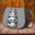 Cute cartoon pandas stacked on top saddle bag