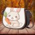 Cute cartoon rabbit holding a carrot saddle bag