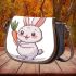 Cute cartoon rabbit holding a carrot saddle bag