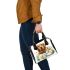 Cute golden retriever with easter eggs shoulder handbag