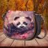 Cute little panda surrounded by pink cherry blossoms saddle bag