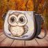 Cute owl cartoon surrounded in the style of stars and flowers saddle bag