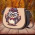 Cute owl teacher with glasses and a book in his hand saddle bag