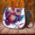 Cute owl with big eyes colorful feathers and beautiful wings perched saddle bag