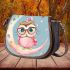 Cute pink owl with a bow and glasses sitting on the moon saddle bag