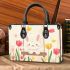 Cute white bunny surrounded by colorful tulips small handbag