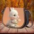 Cute white rabbit holding daisies saddle bag