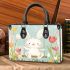 Cute white rabbit sitting on the swing small handbag