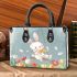 Cute white rabbit sitting on the swing small handbag