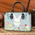 Cute white rabbit sitting on the swing small handbag