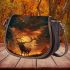Deer with antlers standing in front of trees saddle bag