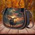 Deer with antlers standing in front of trees saddle bag