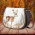 Deer with antlers stands in the forest saddle bag