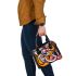 Dynamic composition of overlapping circles and lines shoulder handbag