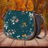 Flowers and butterflies in shades of orange saddle bag