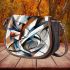 Graffiti style drawing of an abstract geometric shape saddle bag