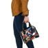 Graffiti style drawing of an abstract geometric shape shoulder handbag