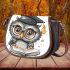 Grey owl with big eyes wearing glasses saddle bag