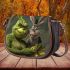 grinchy smile and dancing donkey Saddle Bag Saddle Bag